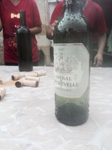 A soggy bottle of Amiral at the Chateau Beychevelle wine stop 33km into the race